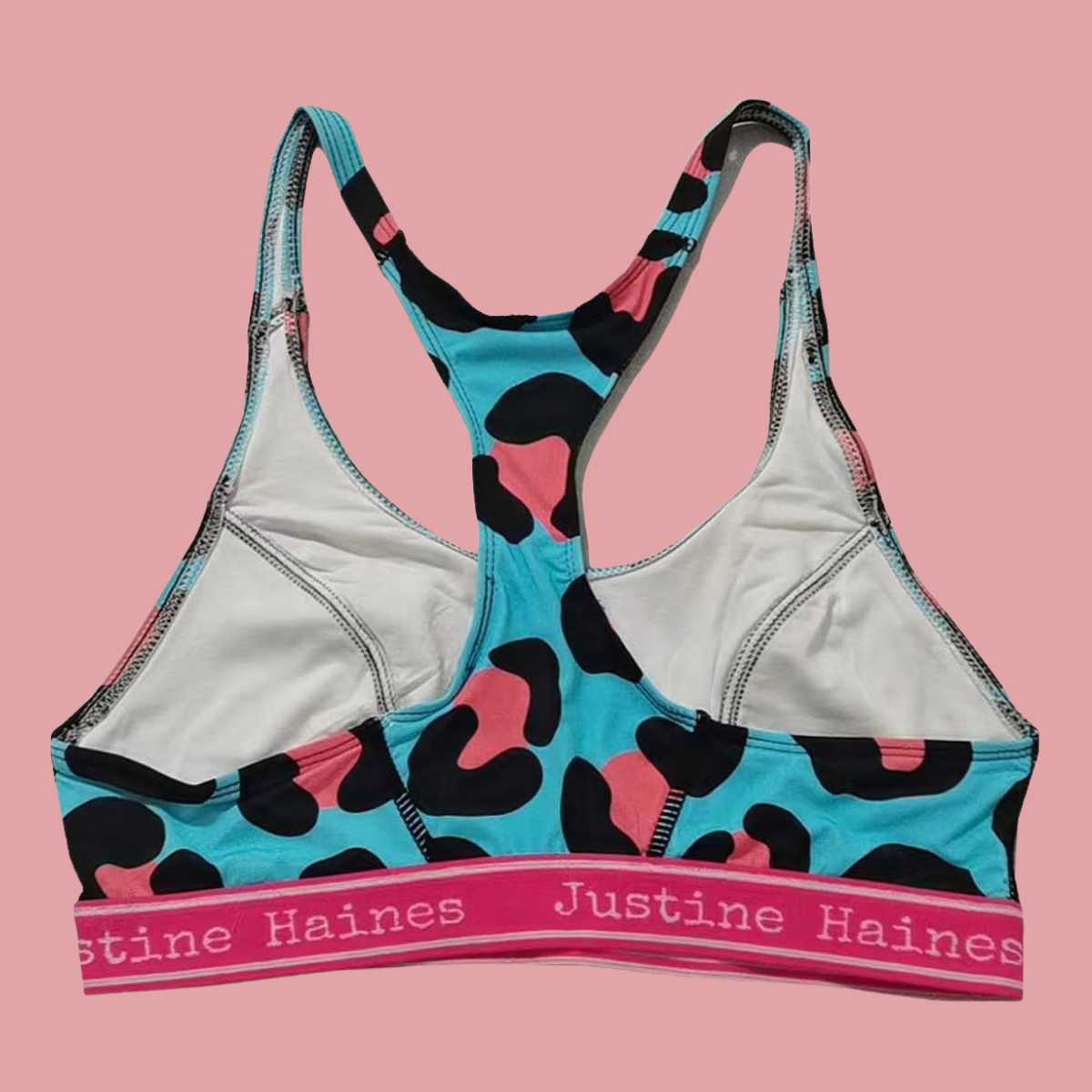 https://www.justinehaines.com/products/full-coverage-t-back-racer-sports-bra-in-cool-blue-animal