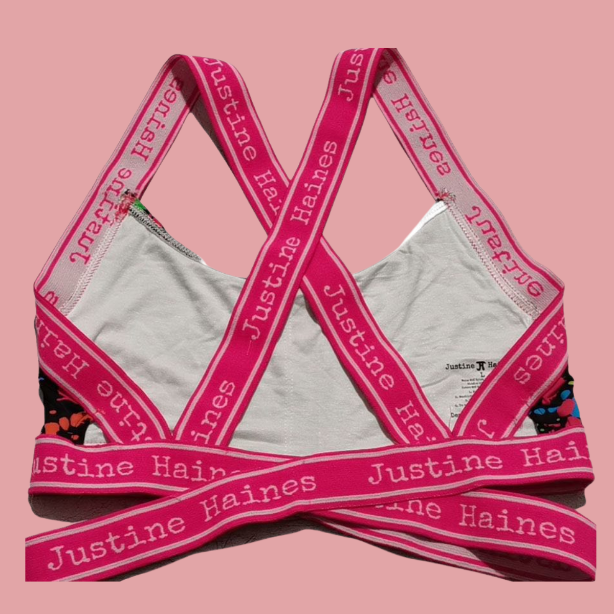 https://www.justinehaines.com/products/sweetheart-crosscross-strappy-bra-top-in-80s-neon-paint
