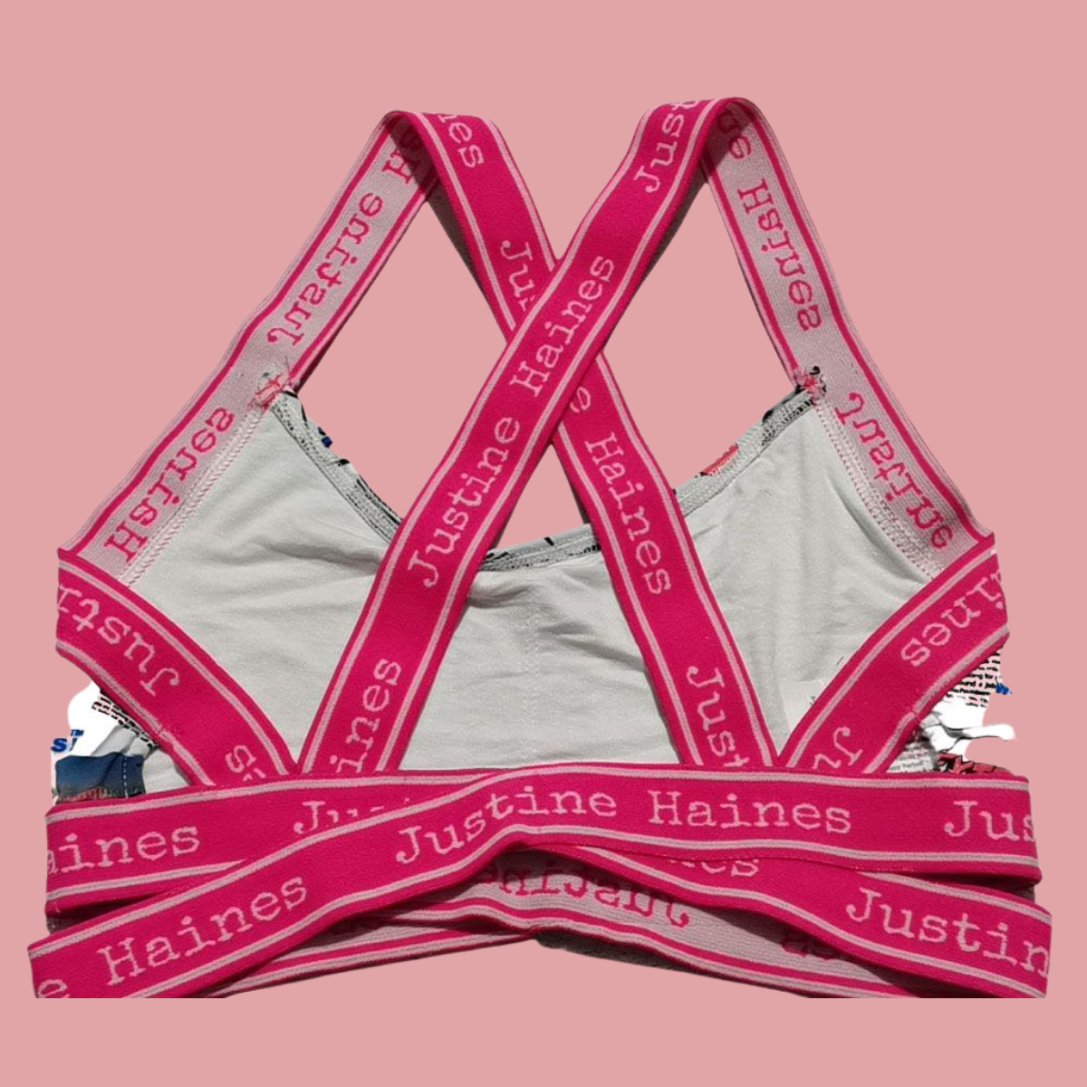 https://www.justinehaines.com/products/sweetheart-crosscross-strappy-bra-top-in-fashion-newspaper-print