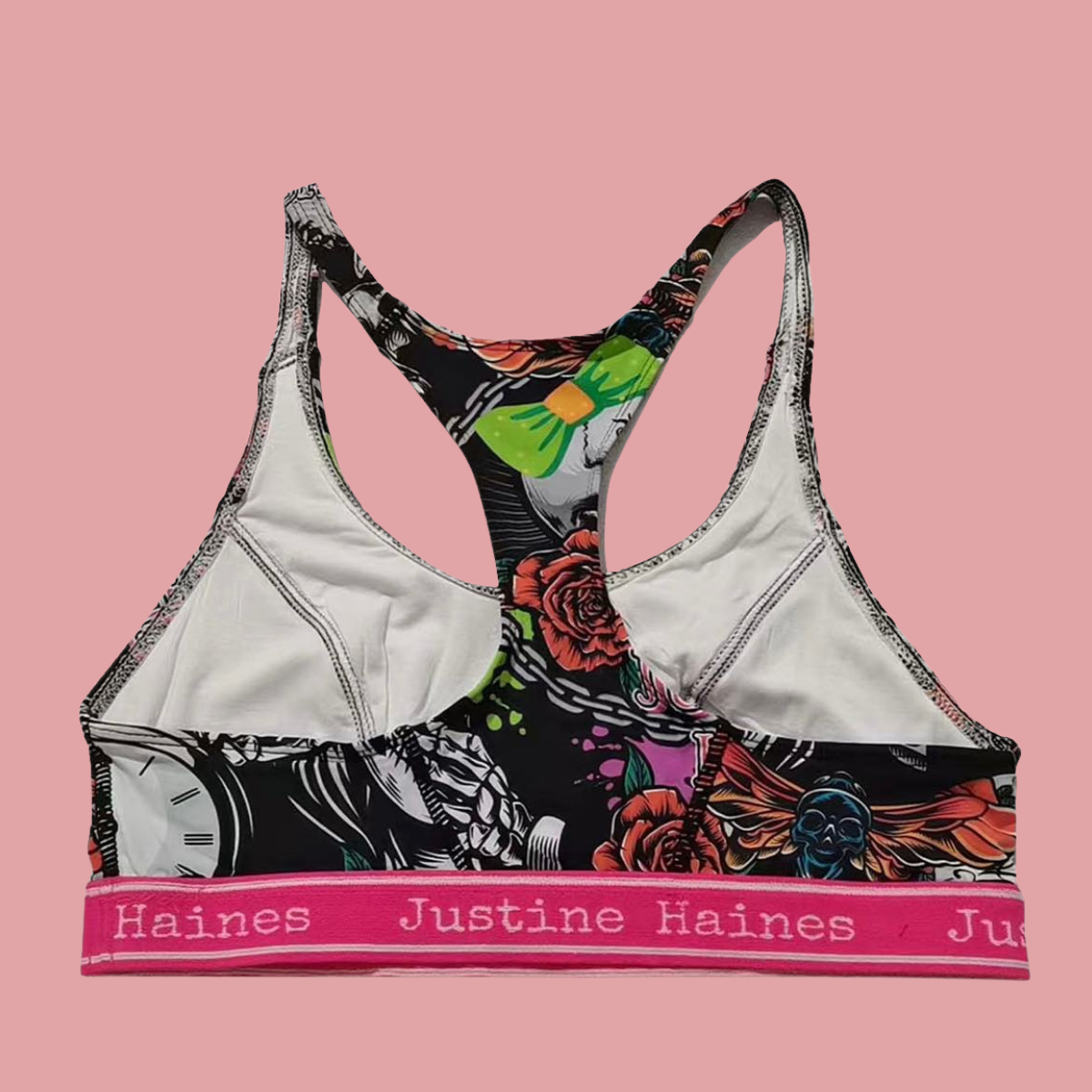 https://www.justinehaines.com/products/full-coverage-t-back-racer-sports-bra-in-skulls-roses