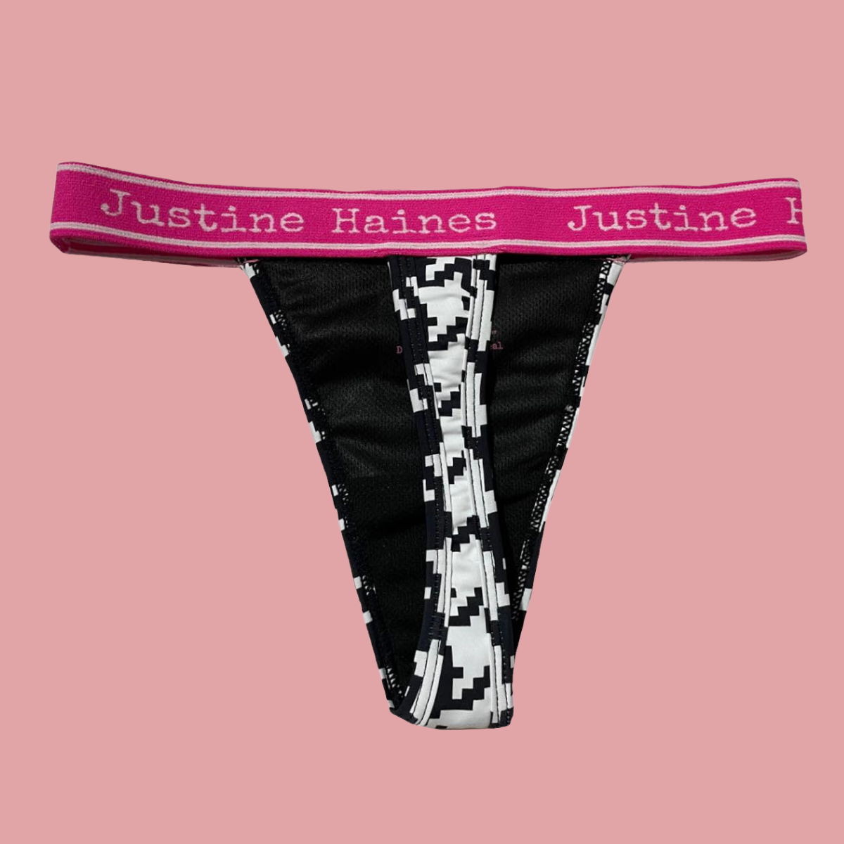 https://www.justinehaines.com/products/wear-thongs-on-your-period-black-white-herringbone
