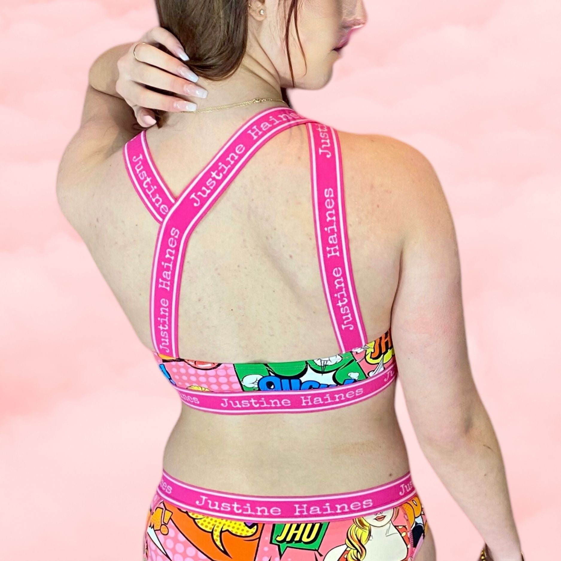 https://www.justinehaines.com/products/coolest-asymmetrical-strappy-bra-top-in-hot-pink-pop-art