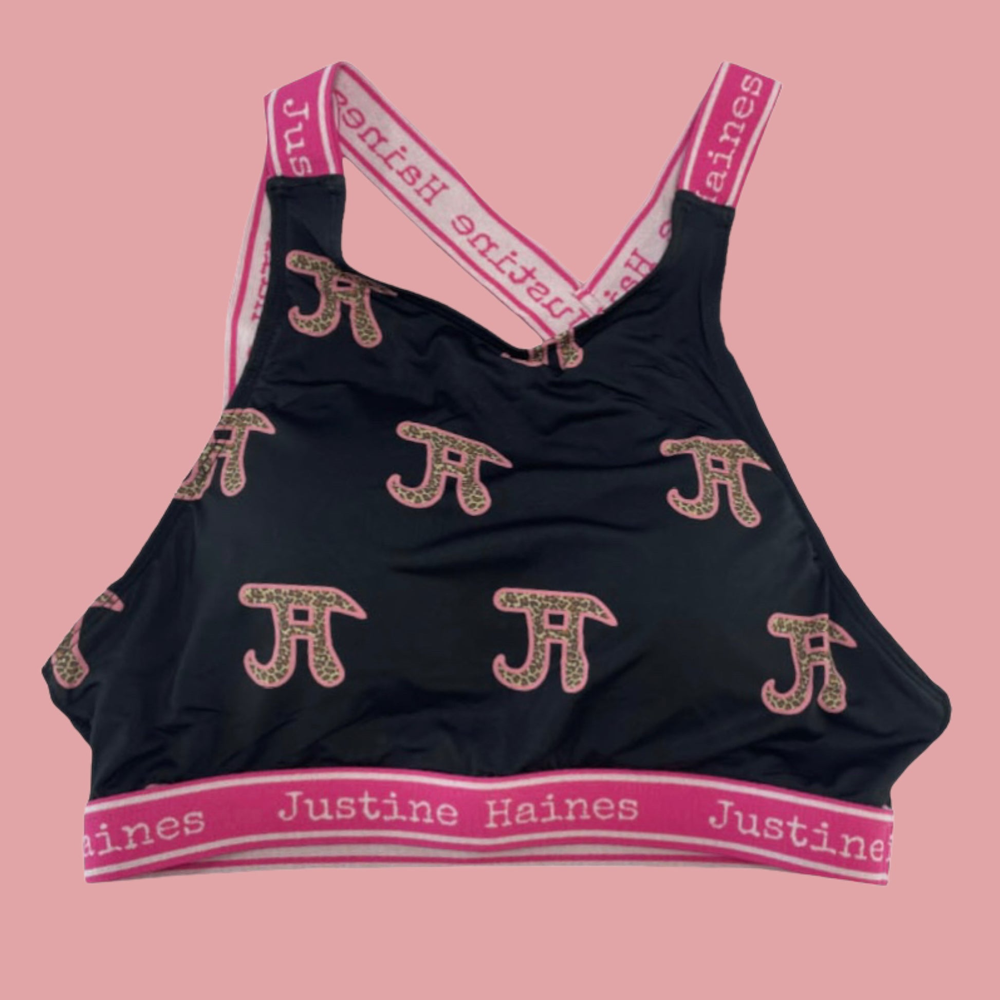 https://www.justinehaines.com/products/coolest-asymmetrical-strappy-bra-top-in-jh-logo-with-leopard