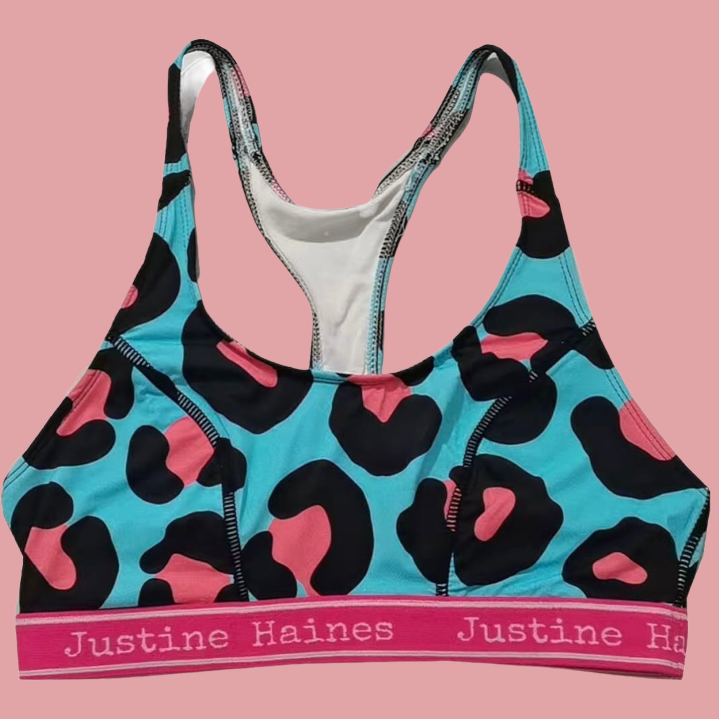 https://www.justinehaines.com/products/full-coverage-t-back-racer-sports-bra-in-cool-blue-animal