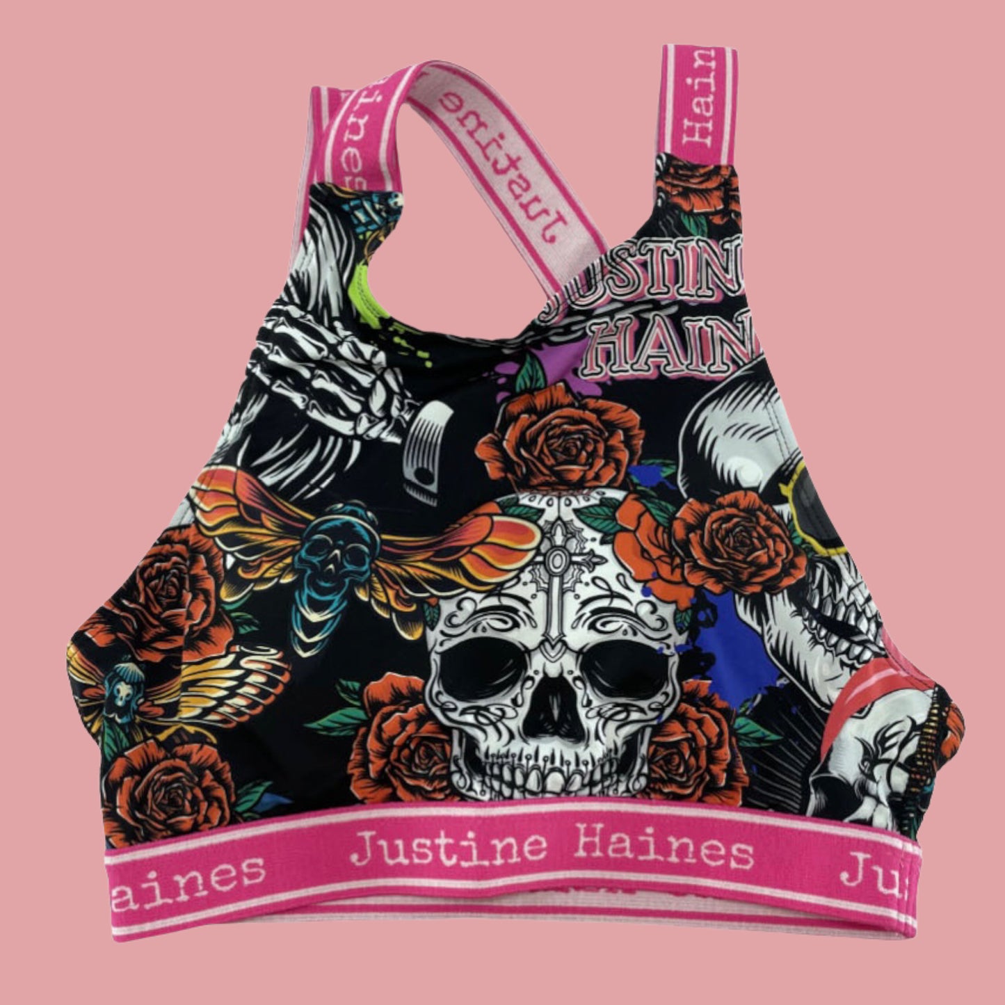https://www.justinehaines.com/products/coolest-asymmetrical-strappy-bra-top-in-skulls-roses
