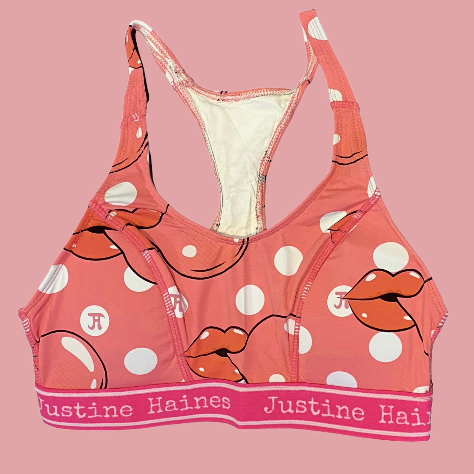 https://www.justinehaines.com/products/full-coverage-t-back-racer-sports-bra-in-pink-bubble-gum