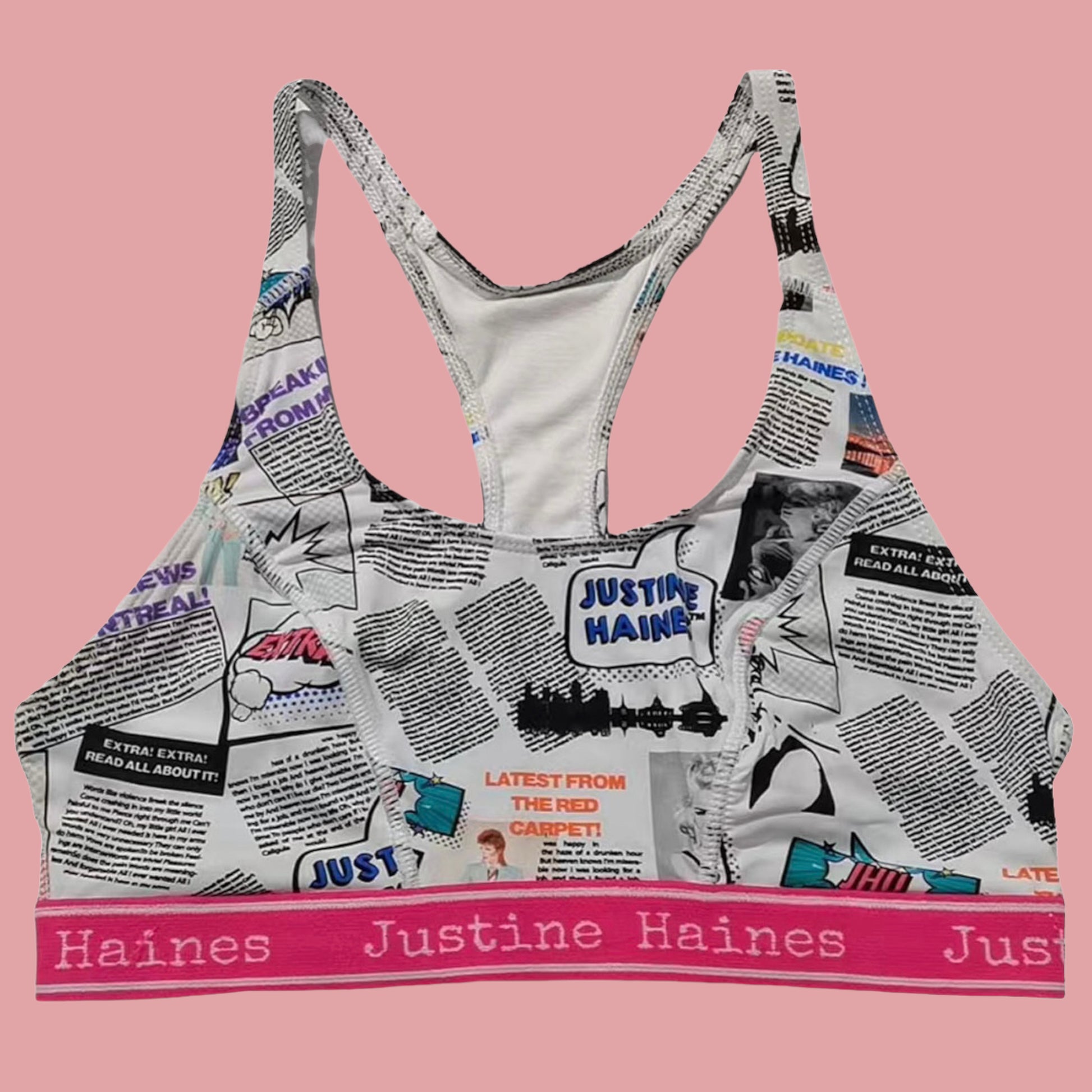 https://www.justinehaines.com/products/full-coverage-t-back-racer-sports-bra-in-fashion-newspaper-print